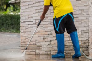 Outdoor floor cleaning with high pressure water jet